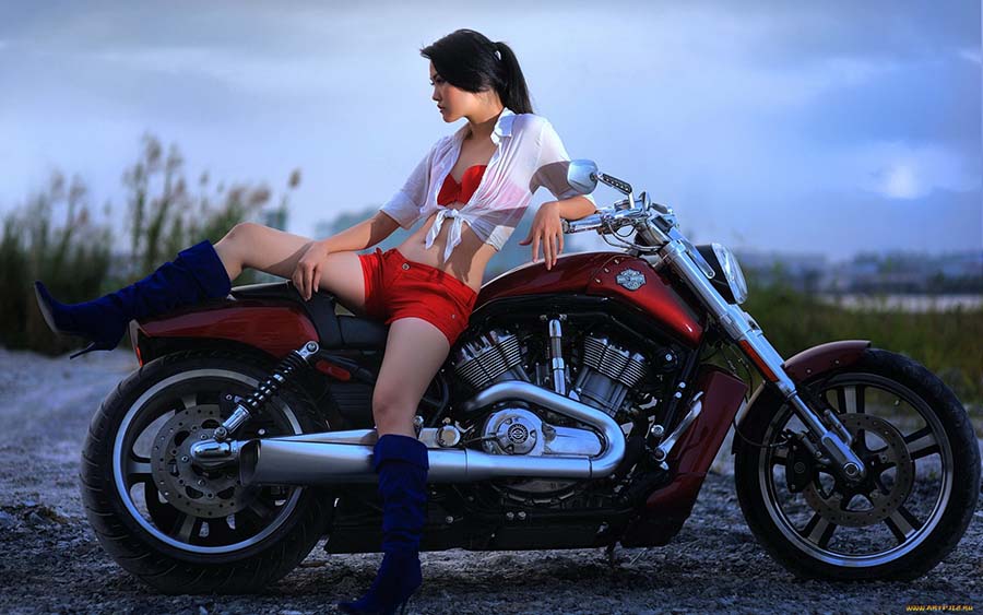 Beautiful girls and motorcycles in Roseau